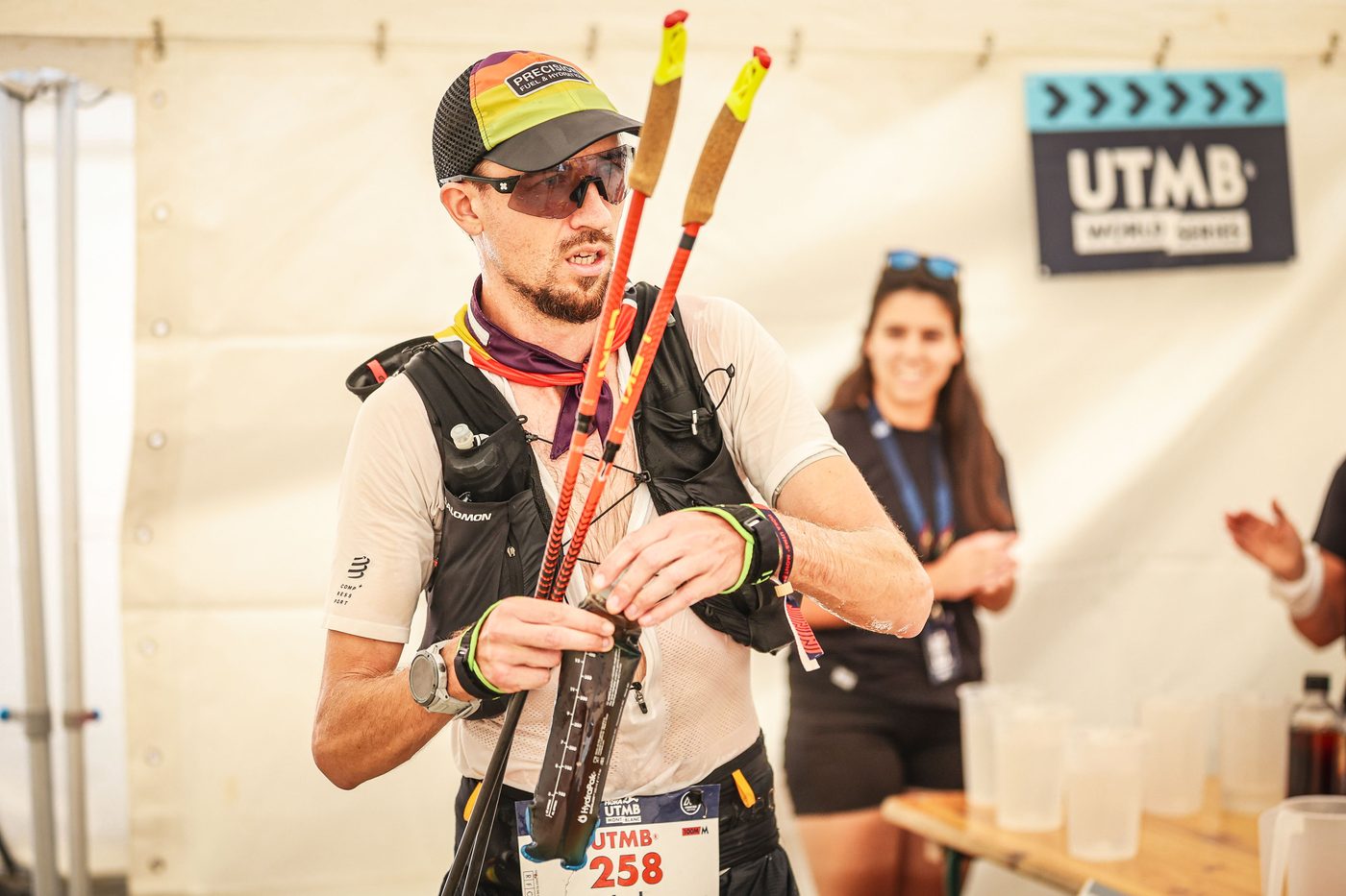 Jack Chamberlain at a UTMB Mont-Blanc aid station with his poles.